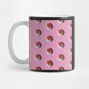 Halloween brain candy arranged in a pattern on a pink background. Mug